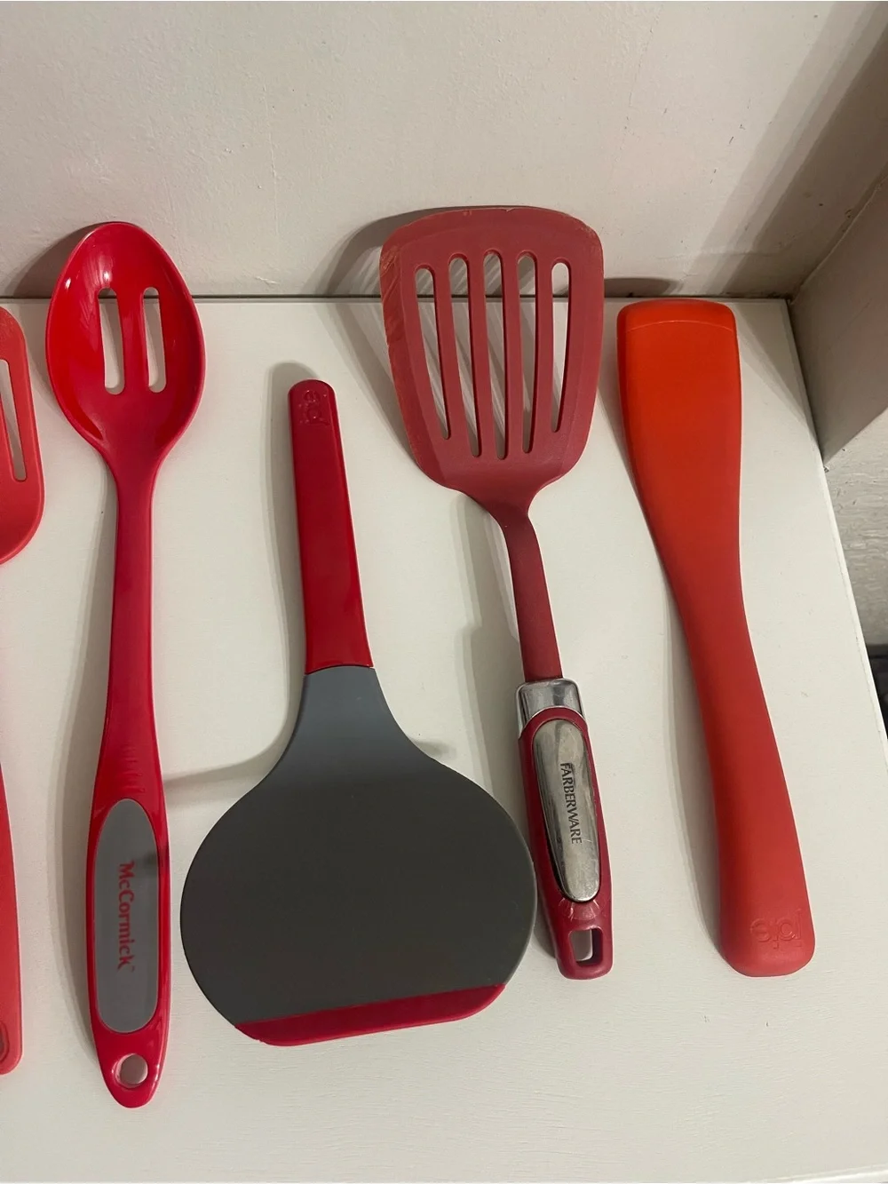 Bundle of Seven Red Silicone Kitchen Utensils